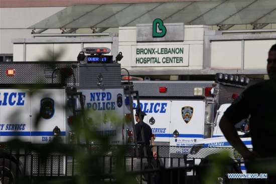 Police vehicles are seen outside Bronx Lebanon Hospital in New York, the United States, on June 30, 2017. (Xinhua/Xu Keshuang)