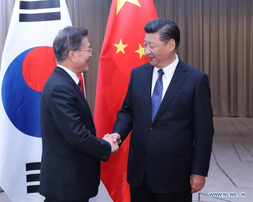 Chinese President Xi Jinping (R) meets with his South Korean counterpart Moon Jae-in in Berlin, Germany, July 6, 2017. (Xinhua/Wang Ye)