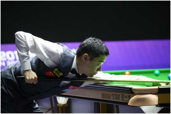 World number four Ding Junhui lines up a shot during a match at the 2017 Little Swan Snooker World Cup in Wuxi, Jiangsu province on July 3. (Photo provided to China Daily)