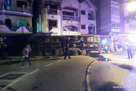 Photo taken by cell phone on July 10, 2017 shows the bus accident site in Patong, Phuket, Thailand. (Xinhua)