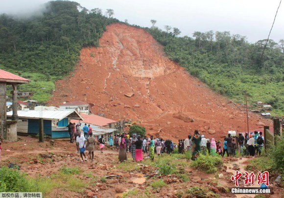 A devastating mudslide hits an area on the outskirts of Sierra Leone's capital city Freetown, August 14, 2017, leaving hundreds of people dead. (Photo/Agencies)