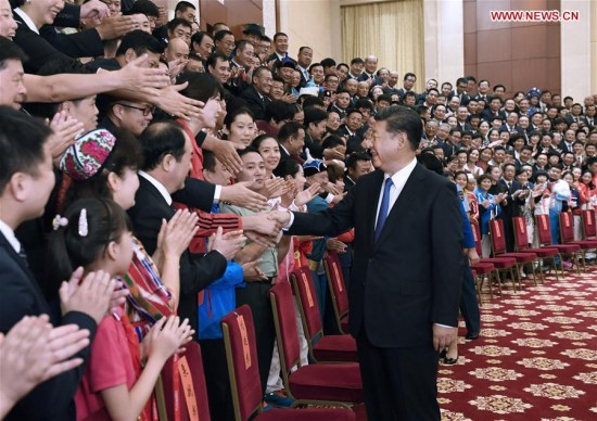 Chinese President Xi Jinping meets with individuals and groups who are advancing China's sporting cause, both professionals and amateurs, as well as representatives of medal winners in sporting events for ordinary people held during the 13th National Games, in north China's Tianjin Municipality, Aug. 27, 2017. (Xinhua/Li Xueren)