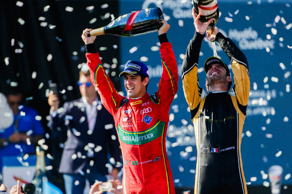 Championship title winner Lucas Di Grassi and Techeetah driver Jean-Eric Vergne celebrate on the podium. (Photo provided to chinadaily.com.cn)