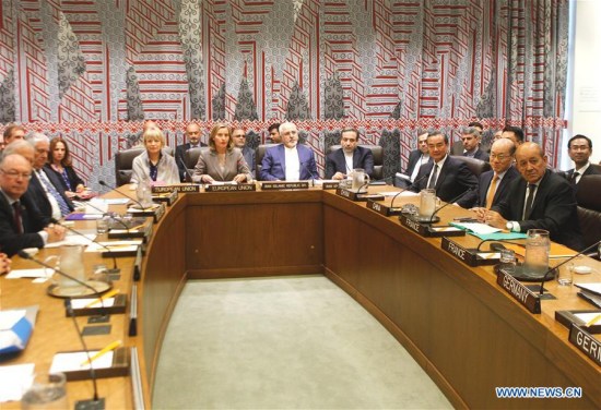 Chinese Foreign Minister Wang Yi (3rd R, front) participates in a meeting between the foreign ministers of the six world powers of Britain, China, France, Germany, Russia and the United States, and Iran at the UN Headquarters in New York, Sept. 20, 2017. (Xinhua)