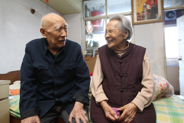 They talk about each other. (Photo by Xu Junwen/chinadaily.com.cn)