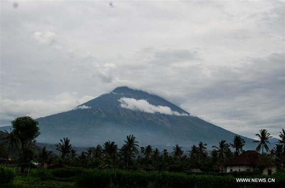 Mount Agung volcano is seen in Bali resort island of Indonesia on Nov. 22, 2017. Mount Agung volcano in Bali resort island of Indonesia erupted on Tuesday, spewing a column of ashes up to the sky, a disaster agency official said. (Xinhua/Muhammad Fauzy Chaniago)