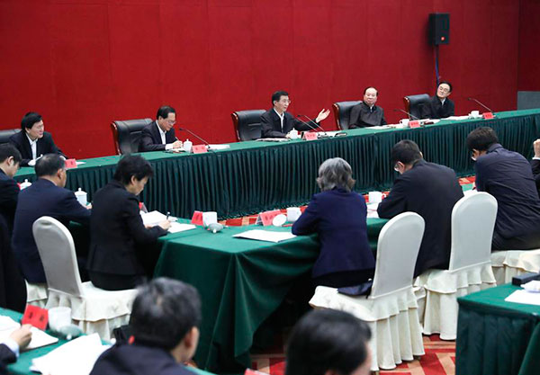 Wang Huning, a member of the Standing Committee of the Political Bureau of the Communist Party of China (CPC) Central Committee, attends a symposium on the Red Boat Spirit in Jiaxing, East China's Zhejiang province, Dec 4, 2017. (Photo/Xinhua)