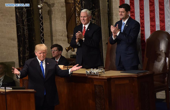 U.S. President Donald Trump(L) delivers his State of the Union address to a joint session of Congress on Capitol Hill in Washington D.C., the United States, Jan. 30, 2018. (Xinhua/Yin Bogu)