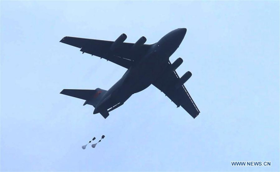 In this undated file photo, China's Y-20 heavy transport aircraft takes part in an airborne and air delivery training. China's Y-20 heavy transport aircraft has undergone its first airborne and air delivery training, said the Chinese air force on Tuesday. According to Shen Jinke, spokesperson of the air force, it marked a leap in the air force's strategic delivery and long-distance airborne combat abilities. (Xinhua)