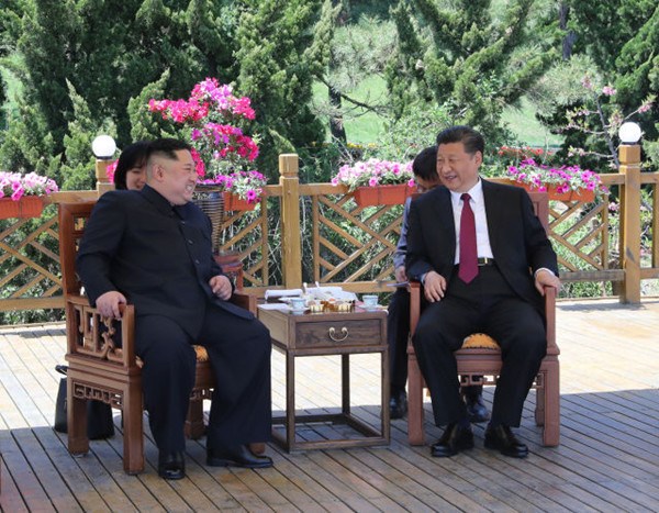 Xi Jinping (R), general secretary of the Central Committee of the Communist Party of China (CPC) and Chinese president, holds talks with Kim Jong Un, chairman of the Workers' Party of Korea (WPK) and chairman of the State Affairs Commission of the Democratic People's Republic of Korea (DPRK), in Dalian, northeast China's Liaoning Province, on May 7-8. (Xinhua/Ju Peng)