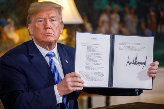 U.S. President Donald Trump displays a signed presidential memorandum at the White House in Washington D.C., the United States, on May 8, 2018. U.S. President Donald Trump said here on Tuesday that the United States will withdraw from the Iran nuclear deal, a landmark agreement signed in 2015. (Xinhua/Ting Shen)