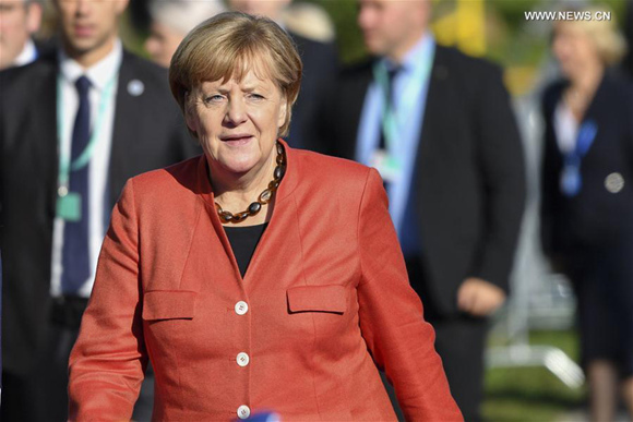 Merkel reaffirms commitment to nuke deal in call with Iranian president 