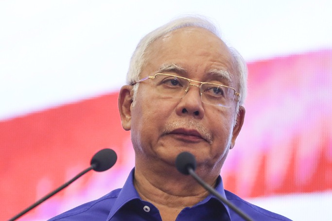 Former Malaysian PM Najib steps down as party president