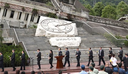10 years on, president hails post-quake reconstruction