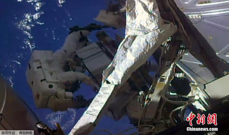 Two astronauts complete 6-hour spacewalk, revamping Int'l Space Station