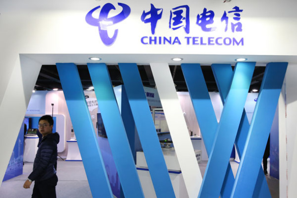 The booth of China Telecommunications Corp is seen at an industry expo in Nantong, East China’s Jiangsu province. (Photo by Xu Congjun/For China Daily)