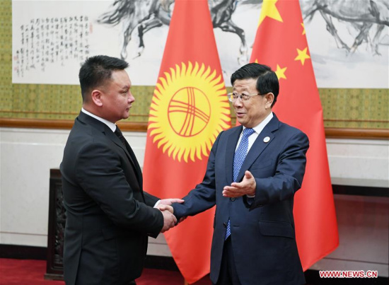Chinese State Councilor and Minister of Public Security Zhao Kezhi (R) meets with Secretary of the Security Council of Kyrgyzstan Damir Sagynbayev, who is also head of a delegation attending the 13th meeting of Shanghai Cooperation Organization (SCO) Security Council Secretaries, in Beijing, capital of China, May 21, 2018. (Xinhua/Zhang Ling)