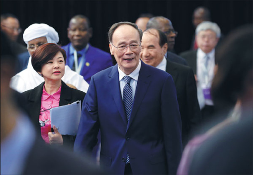 Vice-President Wang Qishan attends the Third Forum on China-Africa Local Government Cooperation in Beijing on May 8. More than 400 people attended the forum. (Photo/China Daily)