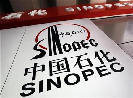 Sinopec Group announced Tuesday one of its subsidiary has agreed to buy from Oklahoma-headquartered Devon Energy Corporation one-third of its interest in five new venture plays in the United States wi