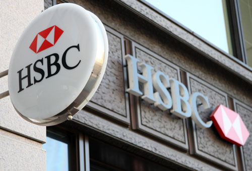 HSBC Holdings PLC's net income rose to $16.8 billion last year from $13.2 billion in the previous 12 months. Costs as a proportion of revenue climbed to 57.5 percent from 55.2 percent on wage inflation and the UK's levy on bank balance sheets, the lender said on Monday. [Photo/Bloomberg] 