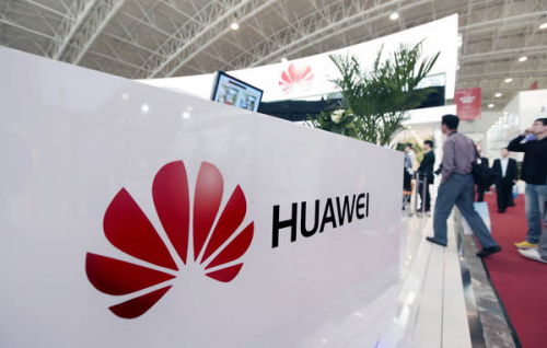 Huawei Technologies Co Ltd's booth at the PT/EXPO COMM trade show in Beijing in September 2011. The Chinese telecom giant moved its Middle East headquarters from Dubai to Bahrain in 2009. [Photo/China Daily] 