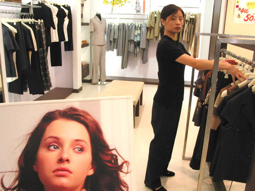 A women's fashion store in Nanjing, capital city of Jiangsu province. The majority of Chinese garment makers are approaching the inventory alarm line, according to the China National Garment Association on its official website. They have enough stock to s