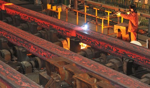 An alloy steel production line at a special-steel mill in Dalian, Liaoning province. China's industrial added value registered 10 percent growth in 2012 and is expected to stay at the same level this year, according to the Ministry of Industry and Information Technology. [Photo / China Daily]