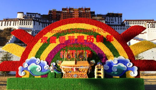 Decorations are seen in front of the Potala Palace to celebrate the coming Spring Festival as well as the Tibetan New Year in Lhasa, capital of southwest China's Tibet Autonomous Region, Feb. 8, 2013. The Tibetan New Year, or Losar, which falls on Feb. 11 this year is one day apart from the Spring Festival which falls on Feb. 10. (Xinhua/Chogo)