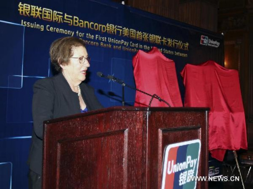 Betsy Cohen, CEO of the Bancorp Bank, speaks during the issuing ceremony for the first UnionPay Card in the United States between the Bancorp bank and UnionPay international in New York City, the United States, April 29, 2013. (Xinhua/Cheng Li)