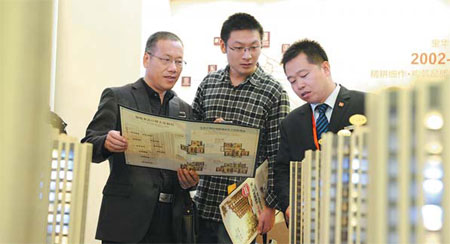 Property prices in China's major cities saw an 11th consecutive monthly increase in April, but the growth rate slowed as the government's latest tightening policies gradually kicked in. [Photo/China Daily]