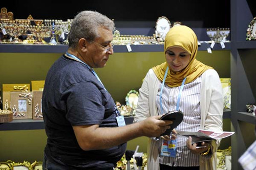 Buyers at the 113th China Import and Export Fair (Canton Fair) in Guangzhou in May. According to statistics from the fair, orders from the BRICS member nations of India, Brazil, Russia and South Africa increased by 5.2 percent year-on-year, while those from countries in the Middle East increased by 3.8 percent. LIANG XU/XINHUA 