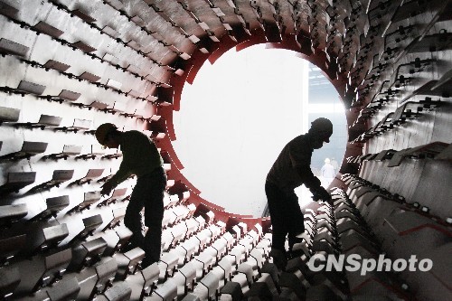 China's factory sector expanded more than expected in May, official data showed over the weekend, injecting some optimism into the world's second largest economy after a private survey dealt a blow to economic sentiment in China. (CNS Photo)