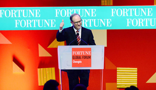 Fortune magazine's managing editor Andy Serwer addresses the opening ceremony of the 2013 Fortune Global Forum in Chengdu, capital of southwest China's Sichuan province, June 6, 2013. [Photo/Xinhua]