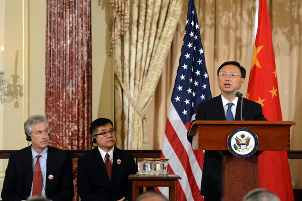 US Deputy Secretary of State William Burns (left) and US Ambassador to China Gary Locke (center) listen to Chinas State Councilor Yang Jiechi at the State Department. Wang Lei / Xinhua