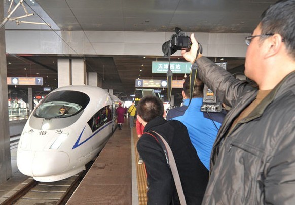 The first train on the new Tianjin-Qinhuangdao high-speed railway is ready to go on Sunday morning. The 287-km line will play a key role in linking up the rail network in Northeast China with that of North and East China. Yue Yuewei / Xinhua  