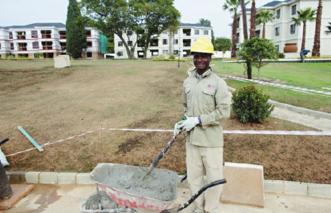 A local employee with Galencia Property (Pty) Ltd at a housing project in South Africa. WANG JING/CHINA DAILY  