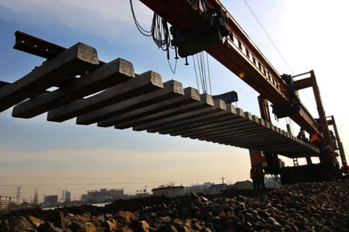 Rail tracks are laid on a route in Nantong, Jiangsu province. (Photo/China Daily)