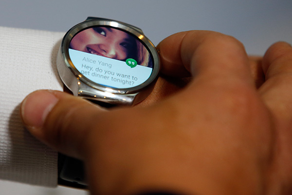 Huawei Watch on display during the Mobile World Congress in Barcelona. On March 3, 2015, Chinese telecom equipment maker Huawei launched its first smartwatch, a round-faced device that works with Android phones, joining a crowded market weeks before the introduction of the highly anticipated Apple Watch. (Photo/China Daily)