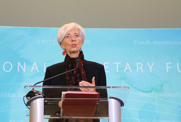 Christine Lagarde, managing director of the International Monetary Fund (IMF), announced on Monday noon that the IMF Executive Board, which convened in the morning, has voted to include the Chinese currency, RMB, into IMF's SDR (Sprecial Drawing Right) basket. Chen Weihua/China Daily