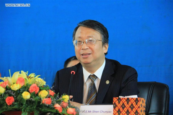 Shen Chunyao, deputy secretary general of the Chinese National People's Congress Standing Committee addresses the audience during the dessemination of China's 13th Five-Year Plan (2016-2020) in Phnom Penh, Cambodia, Dec. 14, 2015. China's 13th Five-Year Plan (2016-2020), finalized at the fifth Plenary Session of the 18th Communist Party of China (CPC) Central Committee on Oct. 29, was disseminated in Cambodia on Monday. (Photo: Xinhua/Zhang Yanfang)