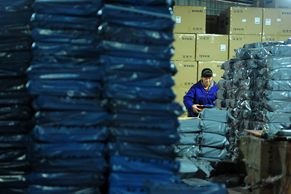 An express delivery firms prepars for the busiest season of the year, Jiujiang city, Jiangxi province, Nov 8, 2015. (Photo/China Daily)