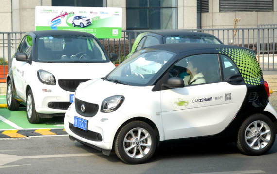 A woman drives a vehicle of Car2Share service in Chengdu, capital of Sichuan province. TAN XI / FOR CHINA DAILY