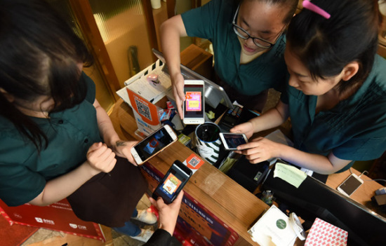 A restaurant in Hangzhou, Zhejiang province, uses King of Glory to attract more customers. The game has more than 200 million registered users. (Photo by Long Wei/For China Daily)