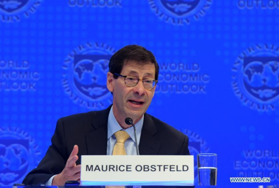 Maurice Obstfeld, chief economist at the International Monetary Fund (IMF), attends a press briefing at the IMF headquarters in Washington D.C., the United States, on Oct. 10, 2017. (Xinhua/Yin Bogu)