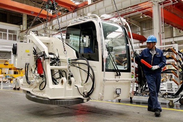 An assembly line at automobile manufacturer Foton's factory in Zhangjiakou, Hebei province. CHEN XIAODONG/CHINA DAILY