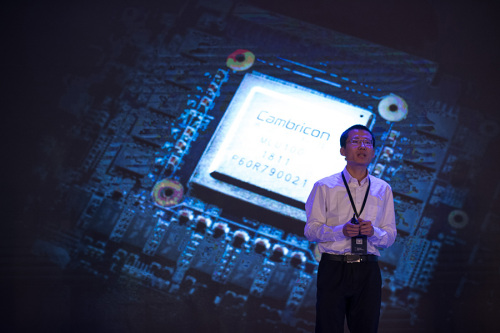 Chen Tianshi, CEO of Cambricon Technologies Corp Ltd, introduces the company's new chip products at a news conference in Shanghai on May 3. (Photo/Xinhua)