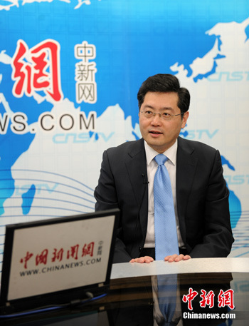 Chinese Foreign Ministry spokesman Qin Gang receives an exclusive interview with China News Service in Beijing, Feb. 22, 2013. (CNS Photo)