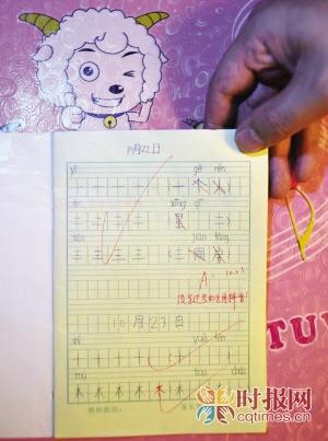 Mrs. Wen shows her daughter's homework with an A-.