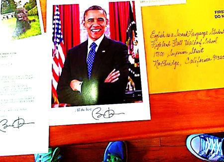 The letter with a photo of  President Obama Liu receives. (Photo source: Chongqing Economic Times) 