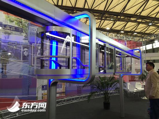 A model of the suspension railway with transparent hanging trains is displayed at he 2014 China International Industry Fair on Tuesday in Shanghai. (Photo: eastday.com) 